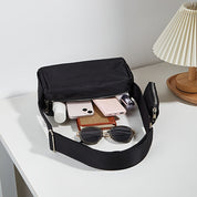 Zoe | Varkaudenestoinen olkalaukku | Vedenpitävä nailon