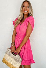 V-neck smock dress with pleated sleeves and ruffles