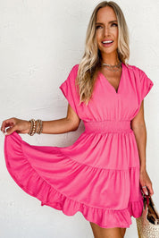 V-neck smock dress with pleated sleeves and ruffles
